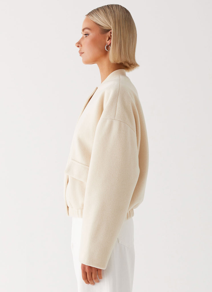 Womens Cloudia Bomber Jacket in the colour Ivory in front of a light grey background