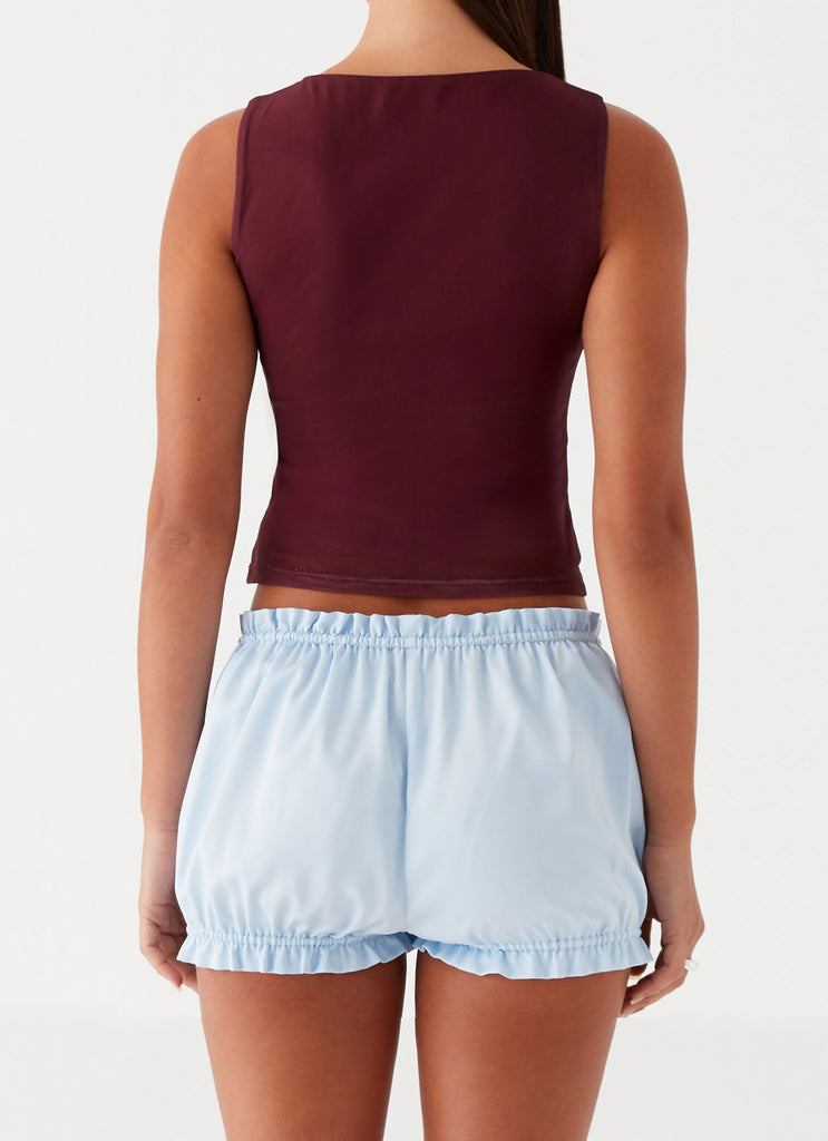 Womens Clubhouse Bloomer Shorts in the colour Blue in front of a light grey background