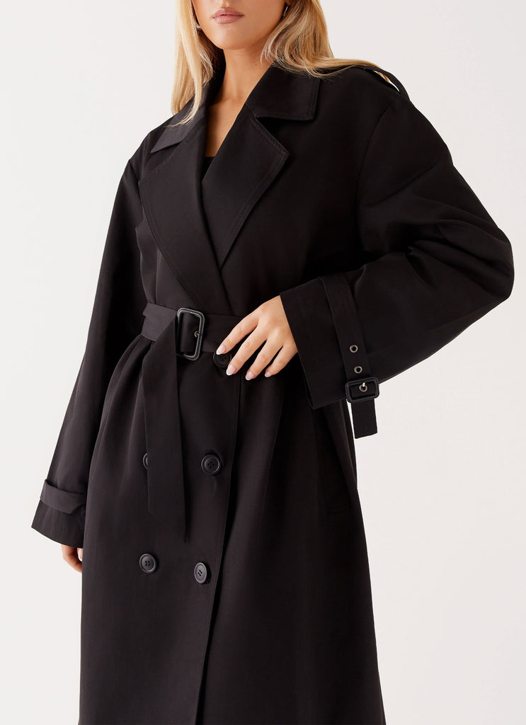 Womens Frenchy Oversized Trench Coat in the colour Black in front of a light grey background