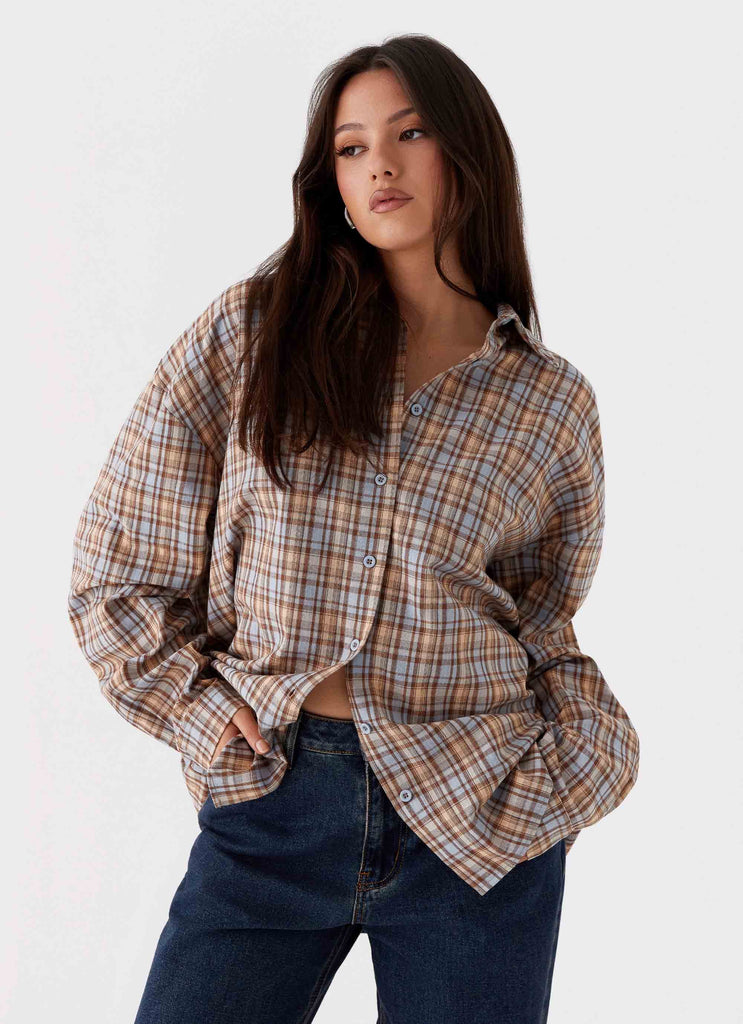 Womens Kyla Oversized Button Up Shirt in the colour Check in front of a light grey background