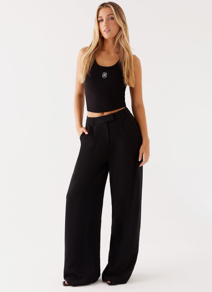 Womens Midnight City Suit Pants in the colour Black in front of a light grey background