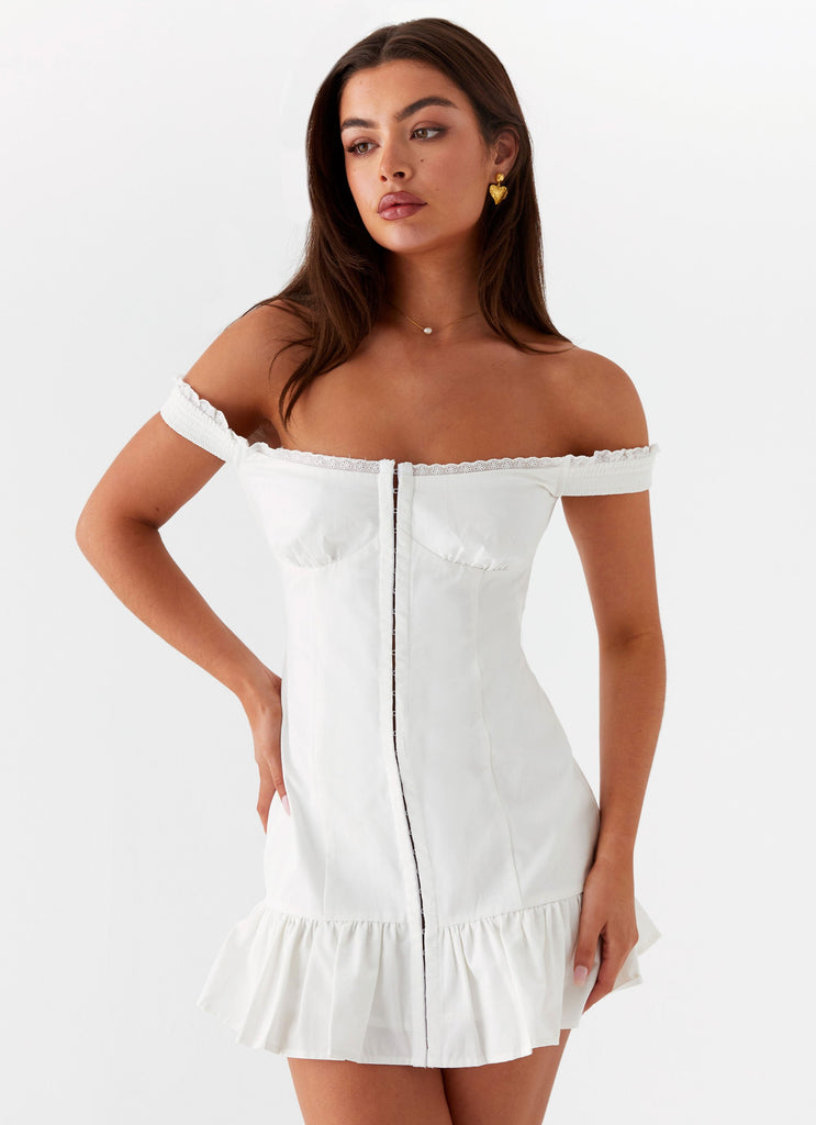 Womens Odessa Frill Mini Dress in the colour White in front of a light grey background