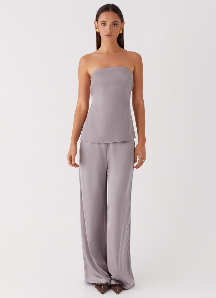 Womens Palm Cove Satin Pants in the colour Grey in front of a light grey background