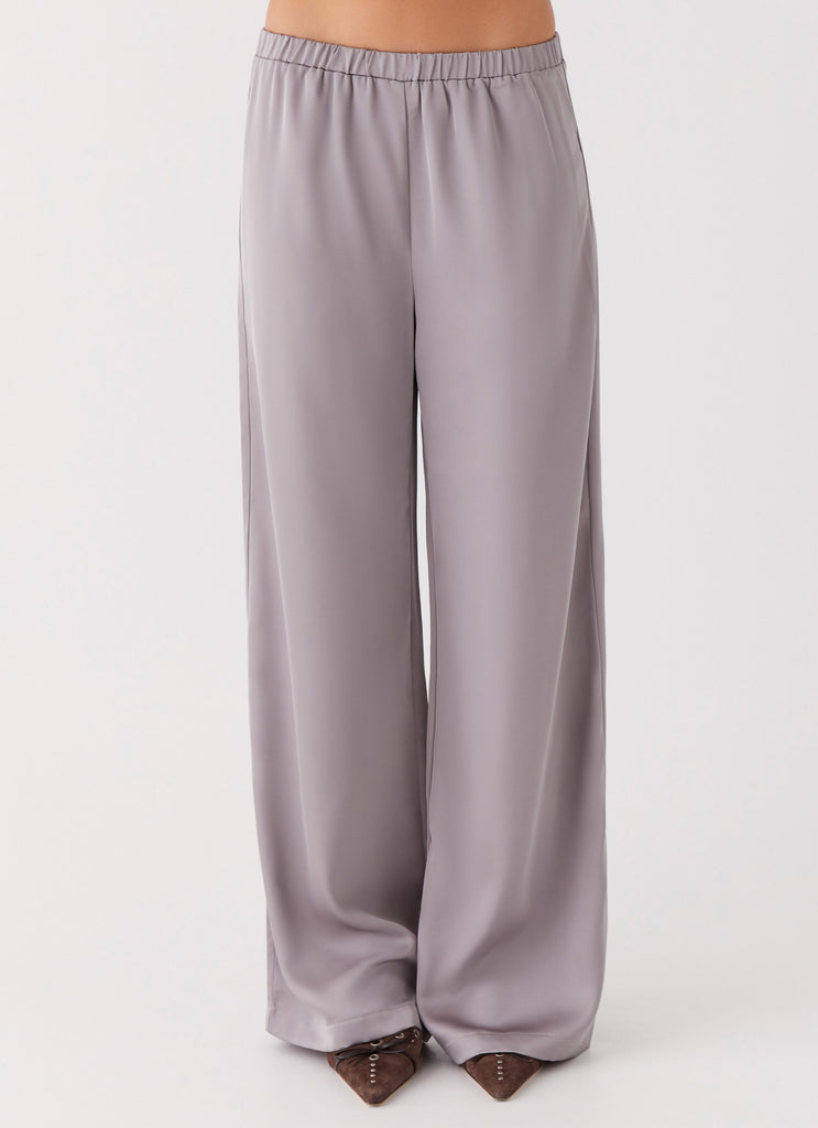 Womens Palm Cove Satin Pants in the colour Grey in front of a light grey background