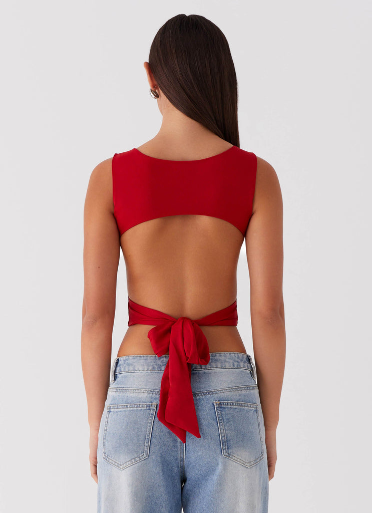 Womens Saskie Tie Top in the colour Ruby Red in front of a light grey background