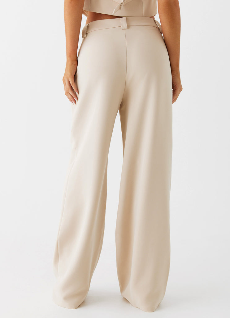 Womens Midnight City Suit Pants in the colour Beige in front of a light grey background