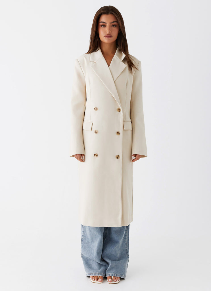 Womens Dalia Double Breasted Blazer Coat in the colour Beige in front of a light grey background