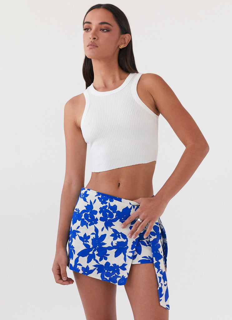 Womens Steal Away Linen Wrap Skirt in the colour Blue Floral in front of a light grey background