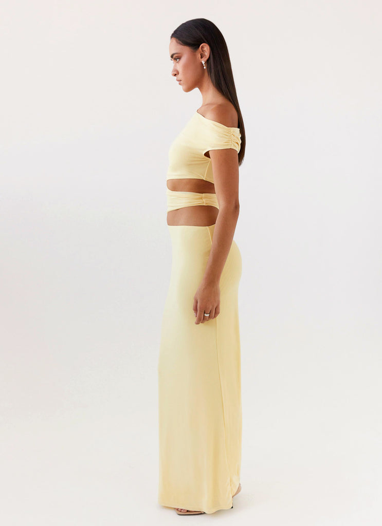 Womens Margot One Shoulder Maxi Dress in the colour Yellow in front of a light grey background