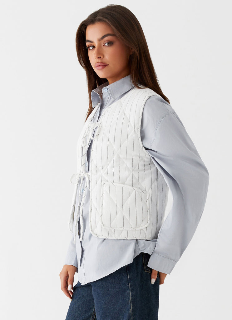 Womens Celini Quilted Vest in the colour White Pinstripe in front of a light grey background