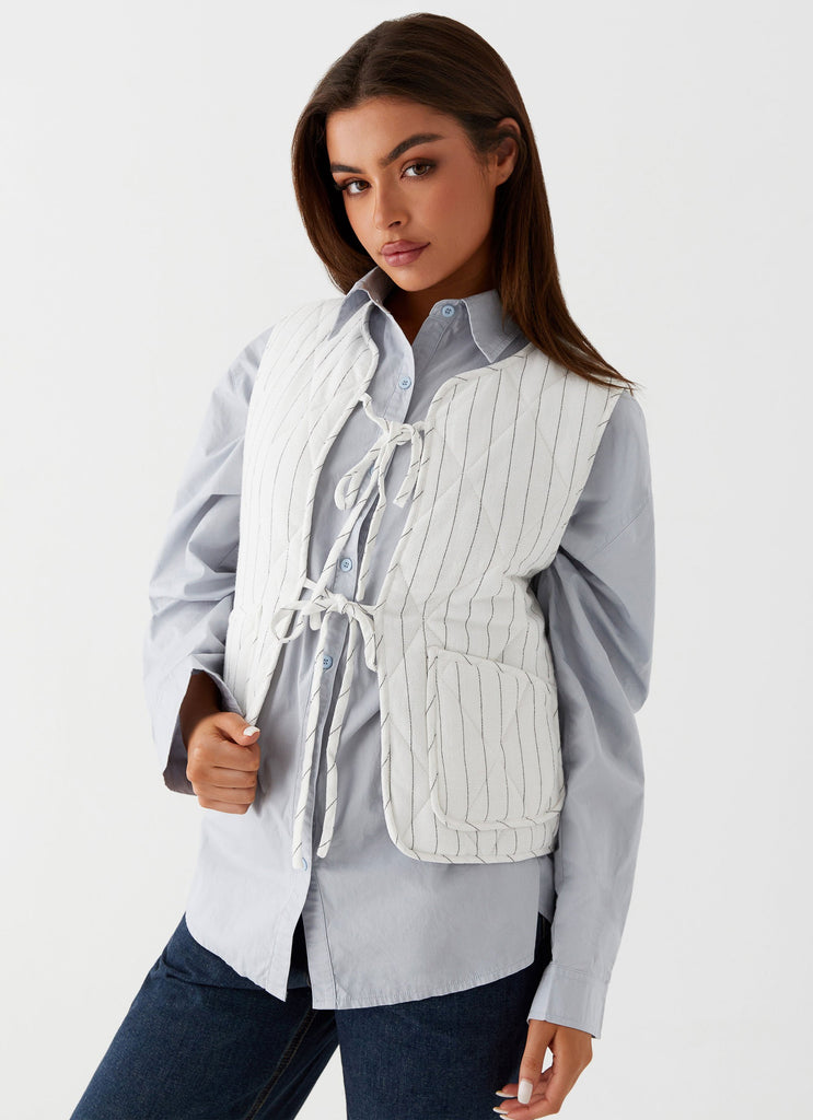 Womens Celini Quilted Vest in the colour White Pinstripe in front of a light grey background