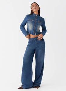 Womens Ride Elegant Baggy Jeans in the colour Vintage Blue Wash in front of a light grey background