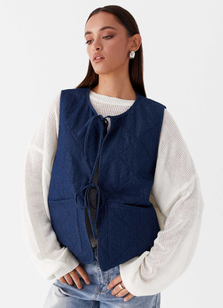 Womens Kennedy Denim Vest in the colour Indigo in front of a light grey background