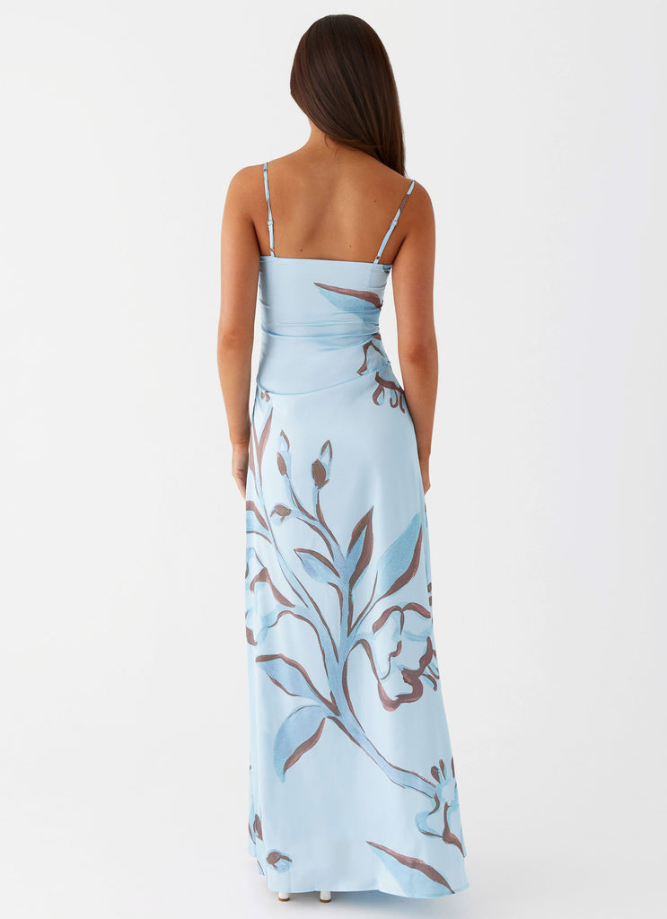 Womens Aster Bloom Maxi Dress in the colour Blue Floral in front of a light grey background