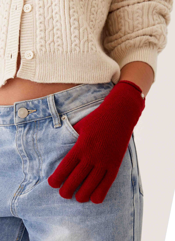 Womens Snow Angel Wool Gloves in the colour Red in front of a light grey background