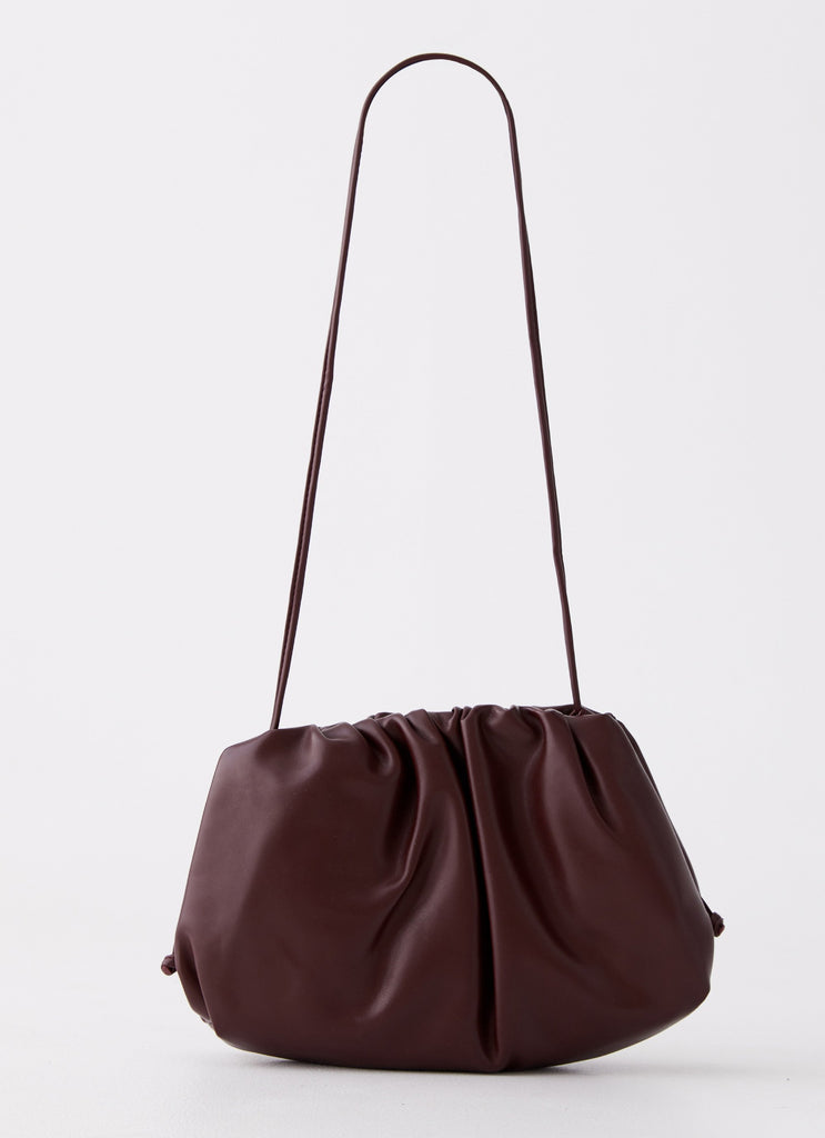 Womens Garcia Bag in the colour Wine Red in front of a light grey background