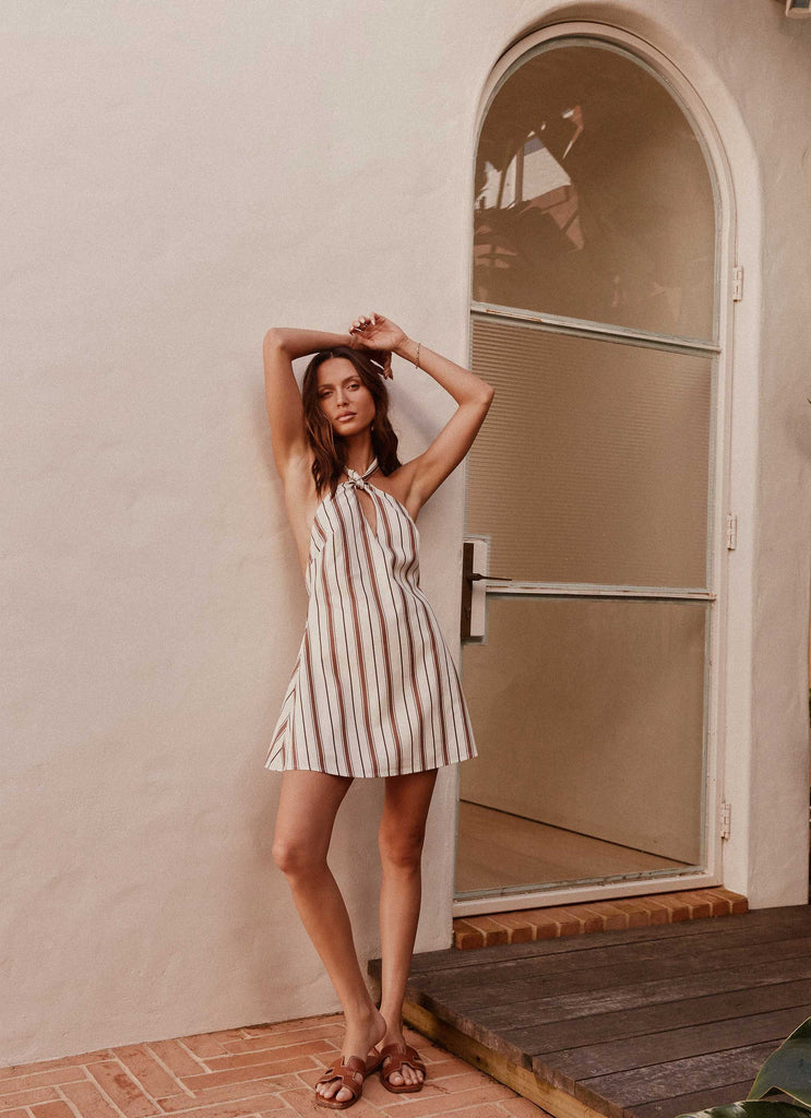 Womens Counting Stars Linen Halterneck Dress in the colour Brown Stripe in front of a light grey background