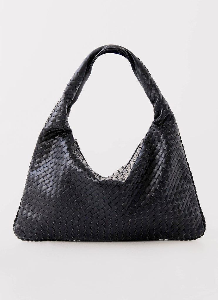 Womens Hacie Shoulder Bag in the colour Black in front of a light grey background