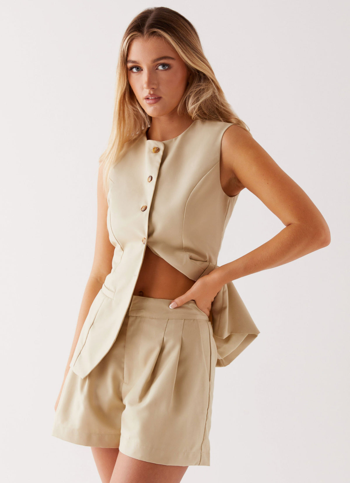 Womens Siena Style Tailored Vest in the colour Beige in front of a light grey background