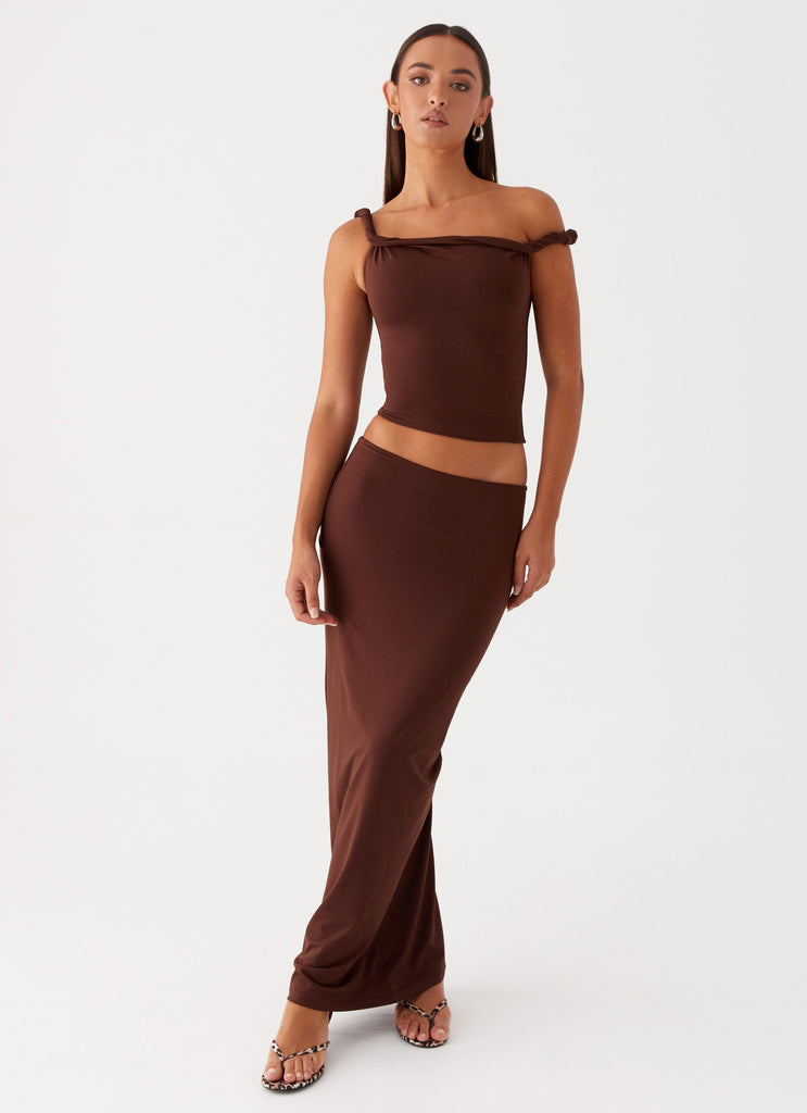 Womens Solace Soul Maxi Skirt in the colour Chocolate in front of a light grey background