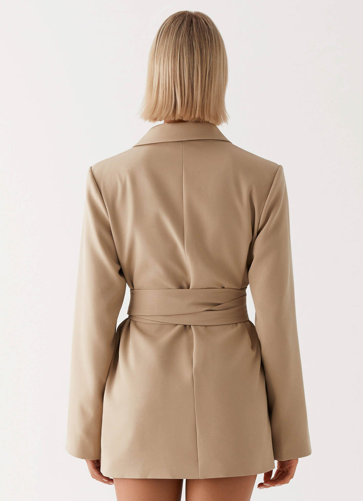 Womens Clara Blazer Dress in the colour Brown in front of a light grey background