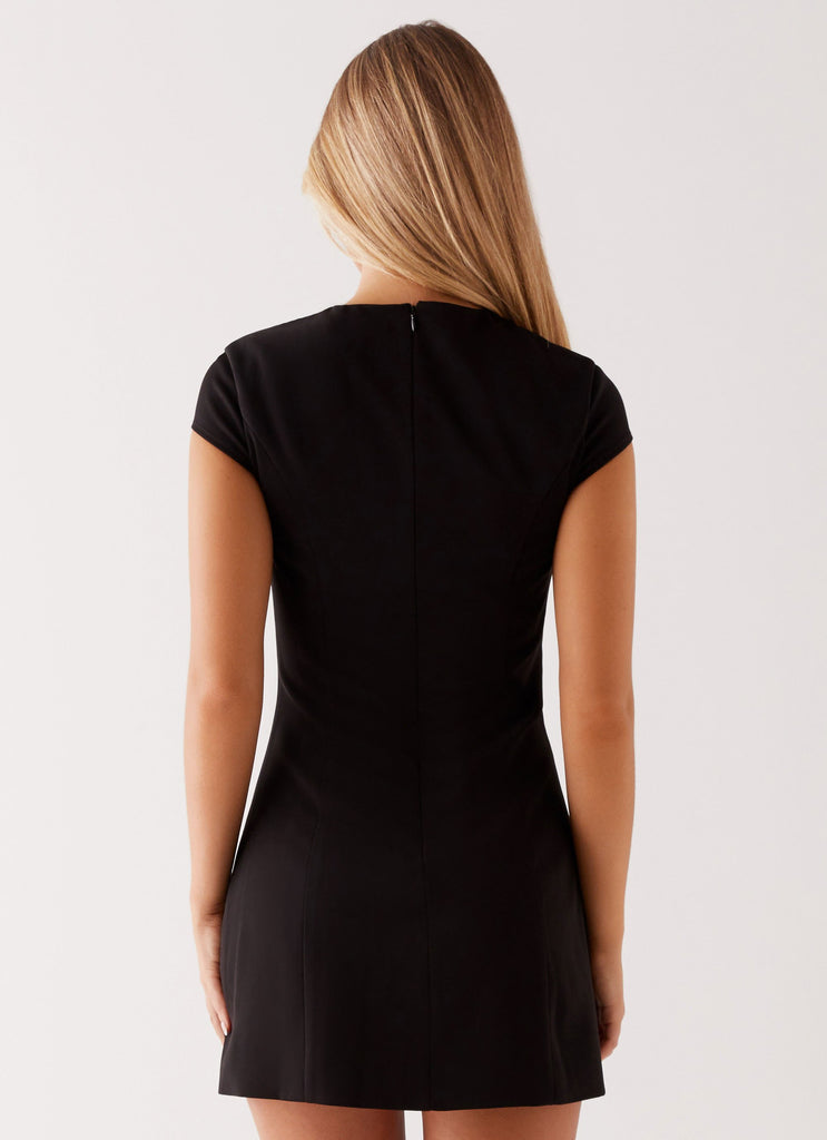 Womens Tia Mini Dress in the colour Black in front of a light grey background