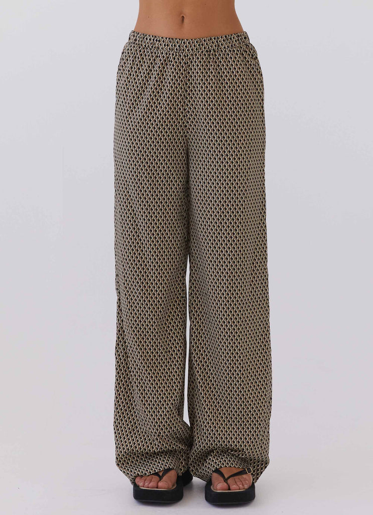 Womens Bruno Wide Leg Pants in the colour Brown Geo in front of a light grey background