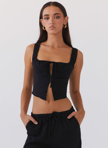 Womens Take Me Away Corset Top in the colour Black in front of a light grey background