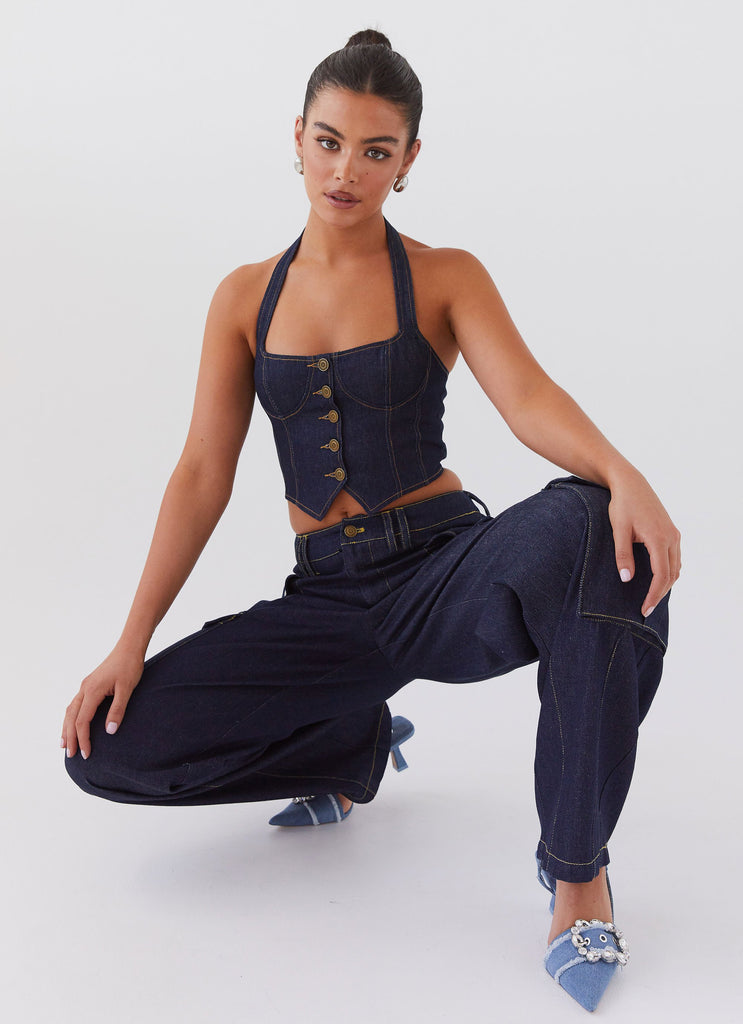 Womens Greedy Denim Cargo Pants in the colour Indigo in front of a light grey background