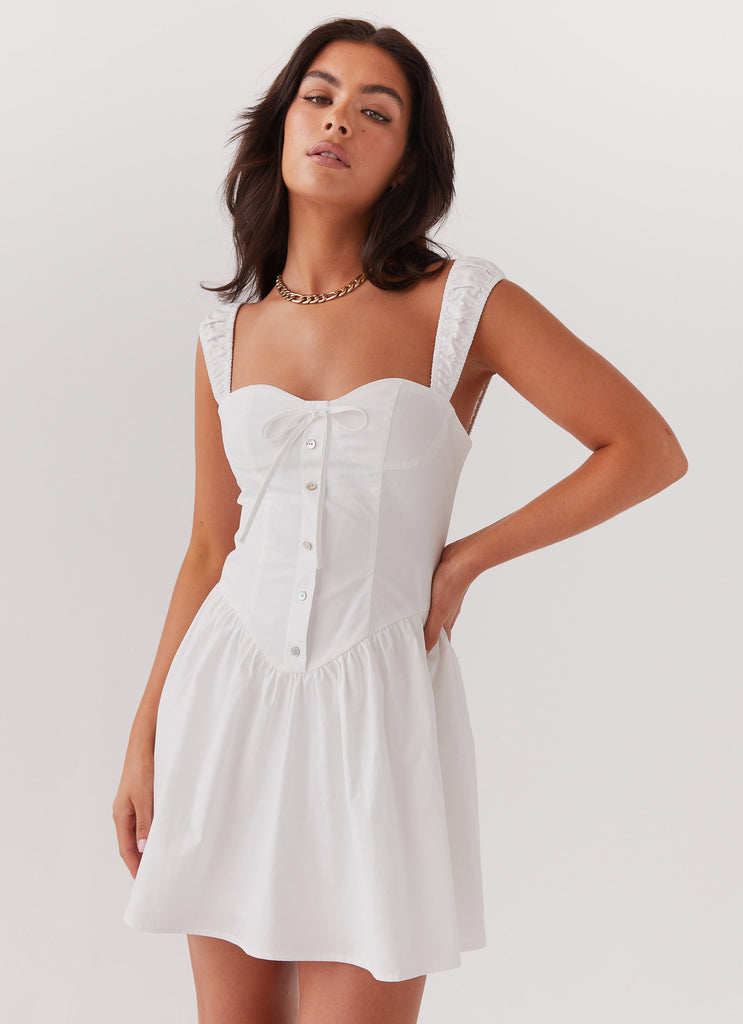 Womens Rebel Heart Corset Dress in the colour White in front of a light grey background