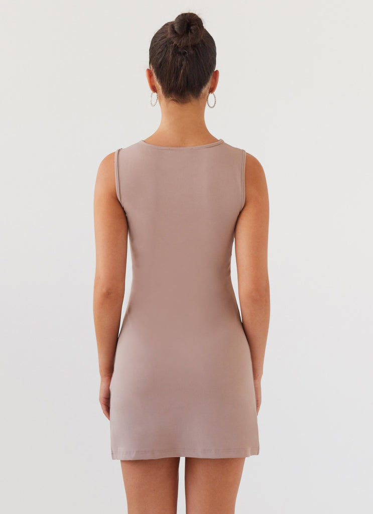 Womens Cosmic Chic Mini Dress in the colour Latte in front of a light grey background