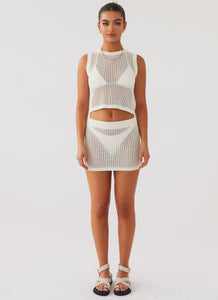 Womens Beach Club Crochet Mini Skirt in the colour White in front of a light grey background