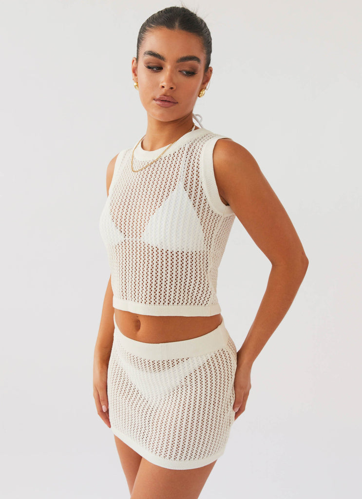 Womens Beach Club Crochet Mini Skirt in the colour White in front of a light grey background